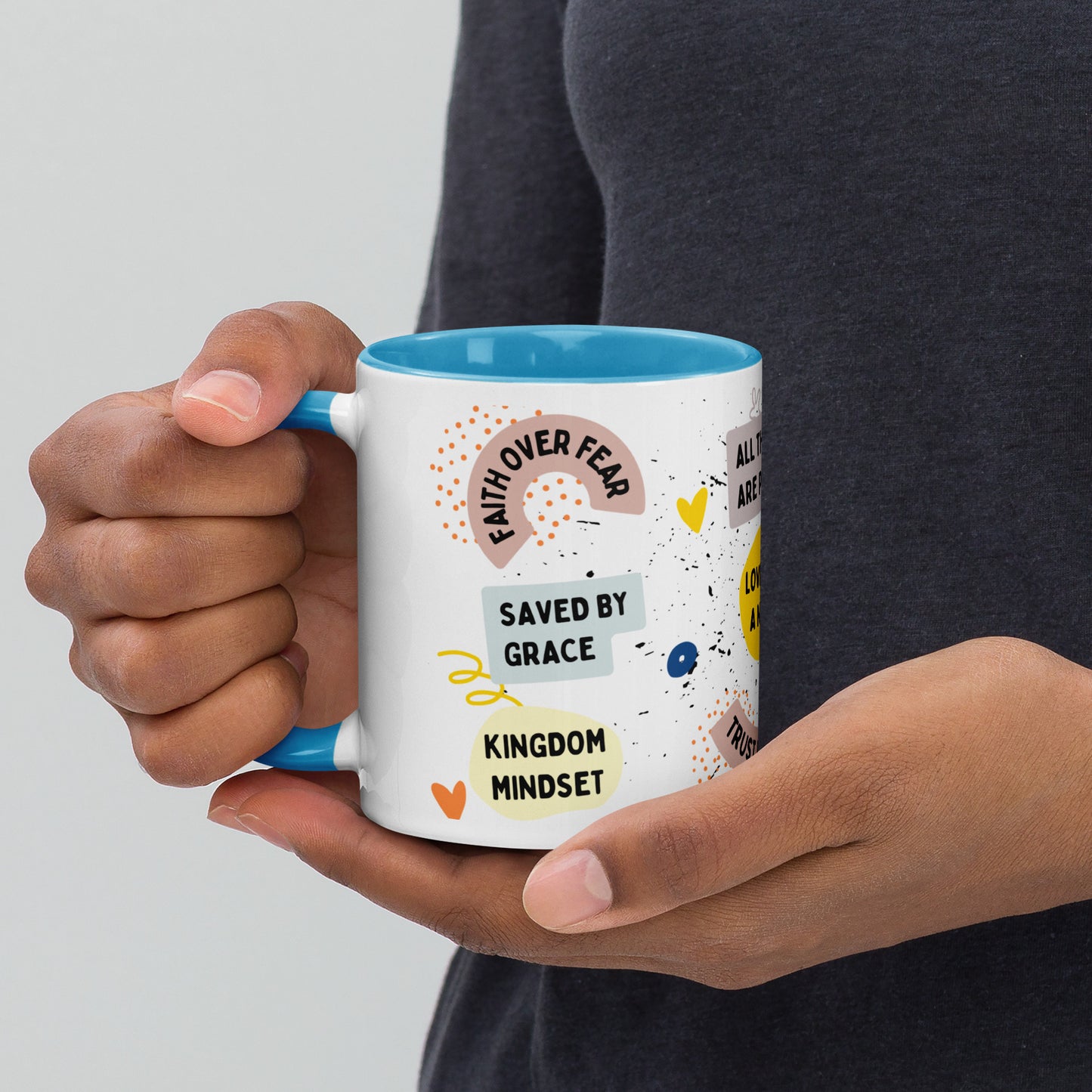 Close-up of faith-based quotes on the Faith-Filled Mug, including 'Saved by grace' and 'Kingdom mindset