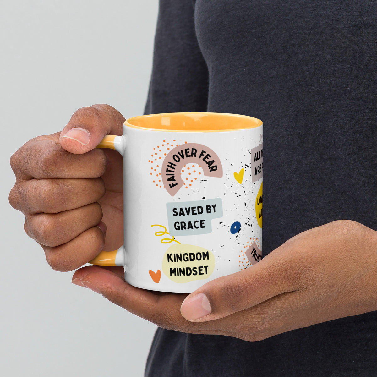 Close-up of faith-based quotes on the Faith-Filled Mug, including 'Saved by grace' and 'Kingdom mindset'