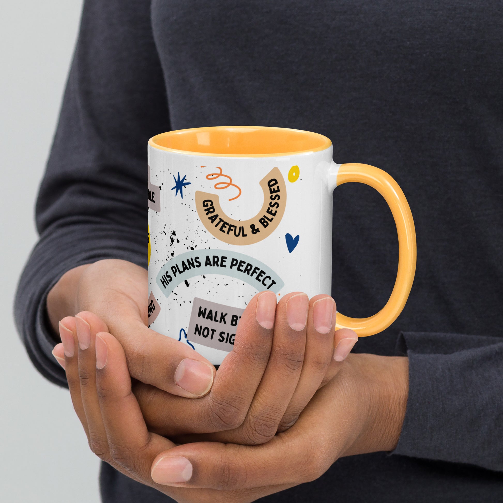 Close-up of faith-based quotes on the Faith-Filled Mug, including 'Saved by grace' and 'Kingdom mindset'